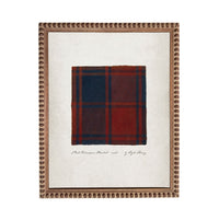 a framed print of a tartan blanket with a red and blue plaid pattern.
