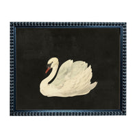A framed painting of a white swan against a black background.