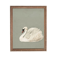 A white swan with a red beak is depicted in a square frame against a light green background.