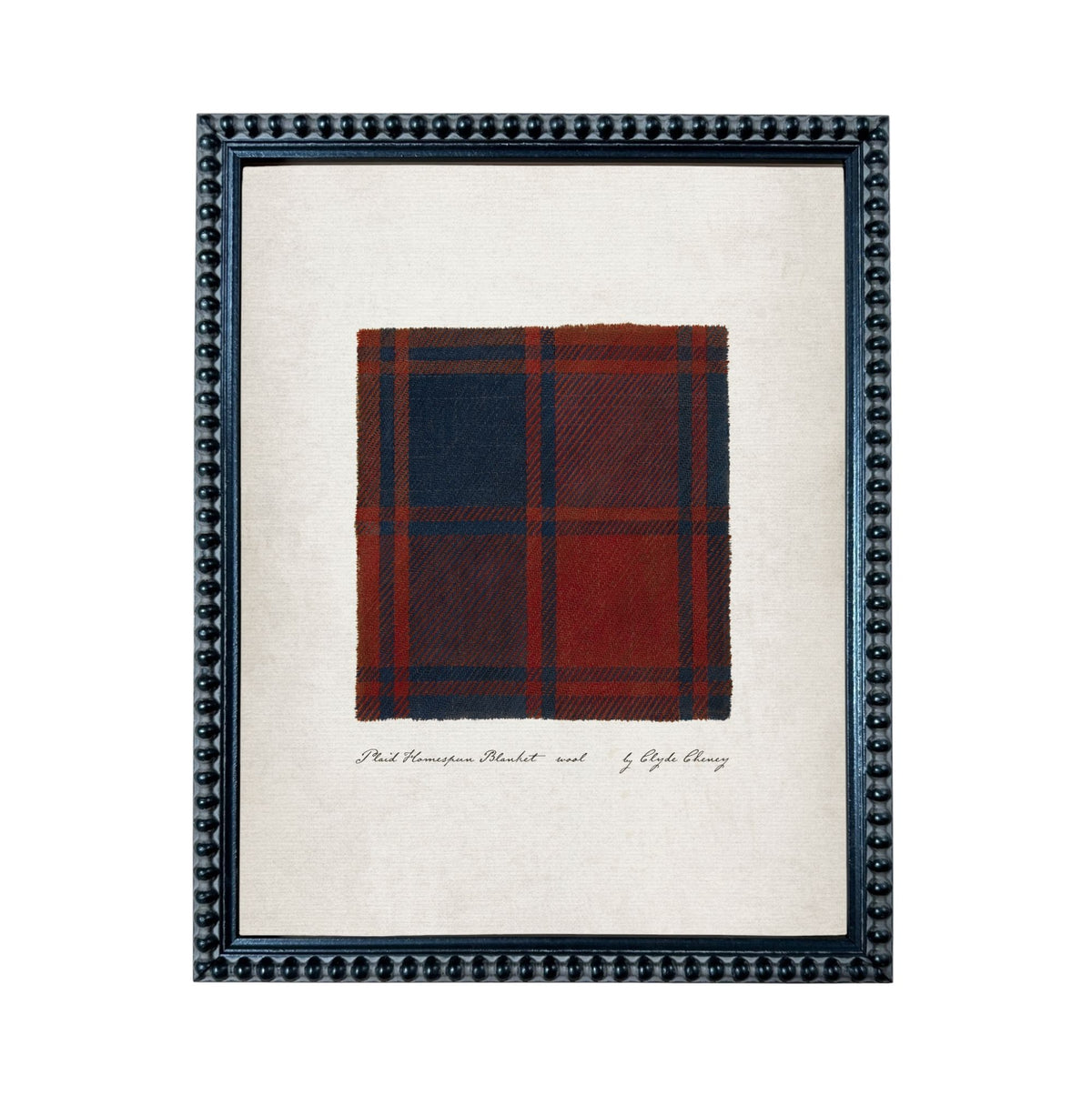 a framed print of a tartan blanket with a red and blue plaid pattern.