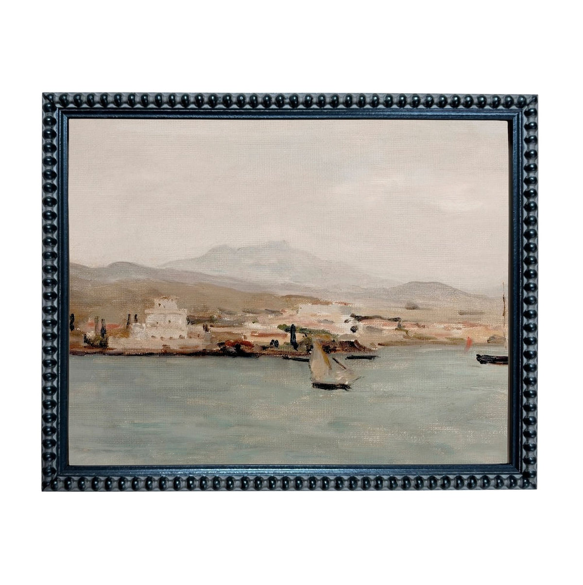 The image is a framed painting depicting a serene coastal scene with boats on the water and a small town in the background.