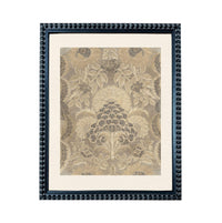 a framed picture with a floral pattern on the inside.