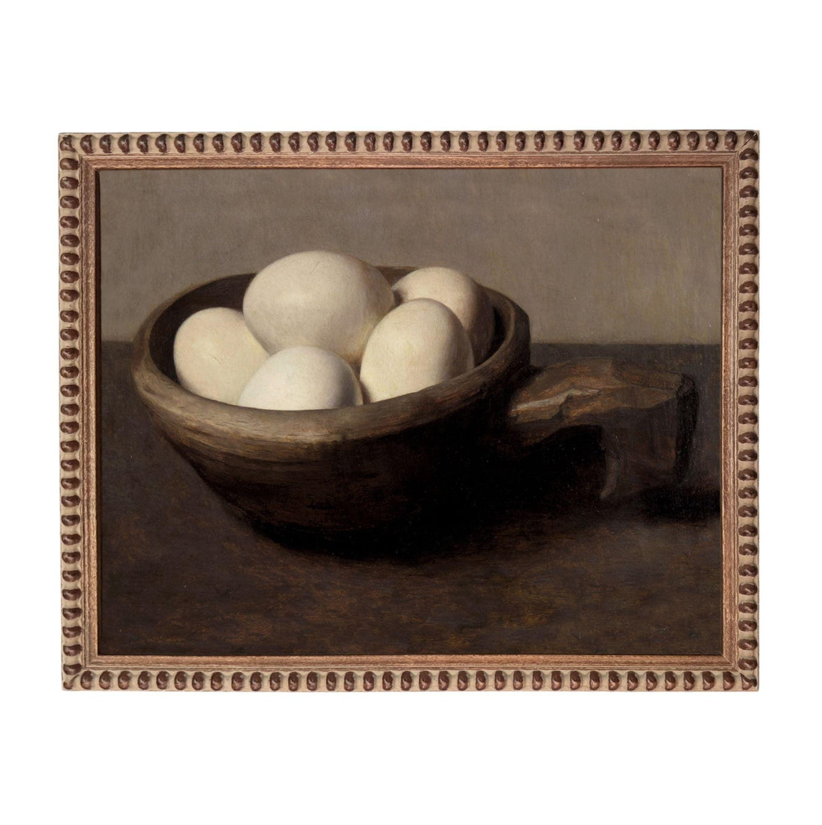 a bowl filled with white eggs, resting on a dark surface.