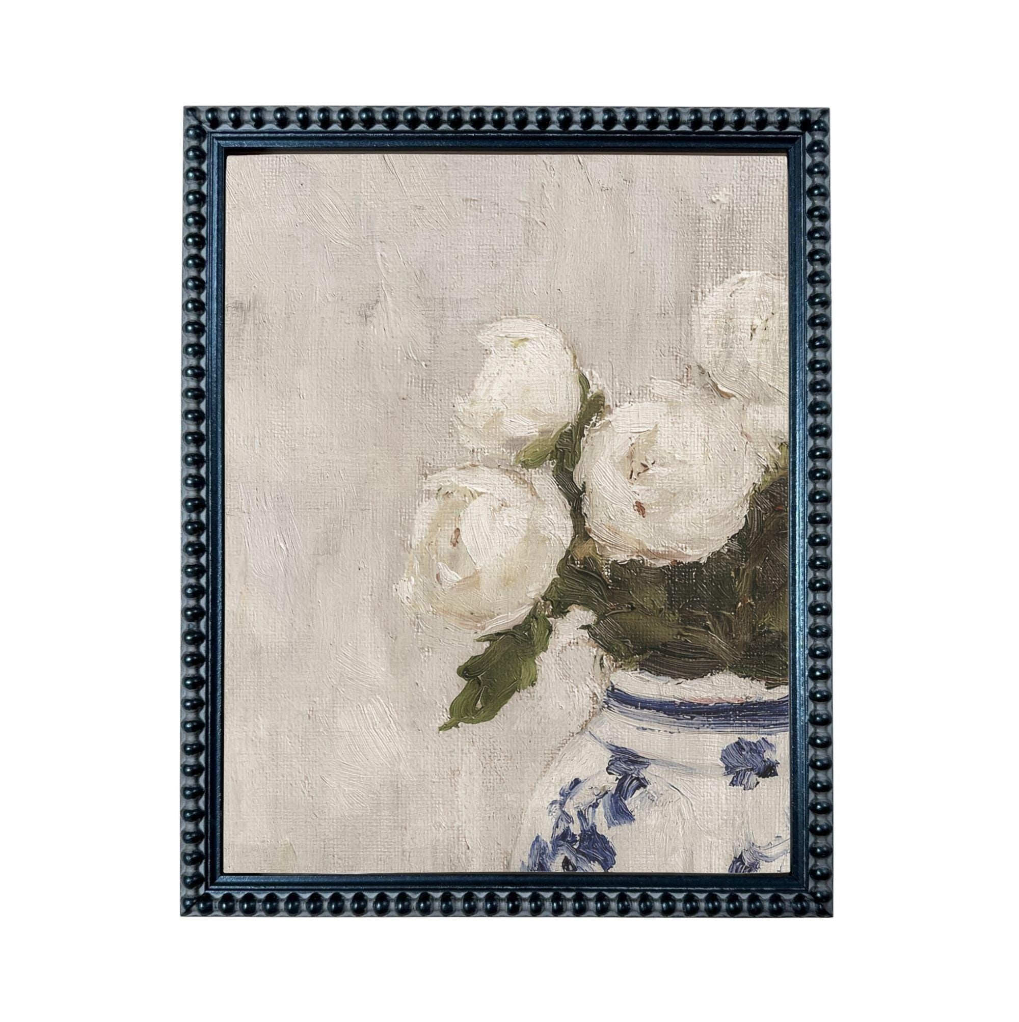 A framed painting depicting a vase filled with white flowers, likely roses, against a light background.