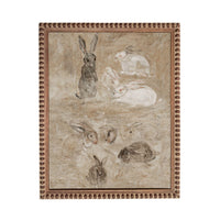 The image is a painting featuring a group of rabbits in various poses and positions, with some standing and others sitting or lying down. The painting is framed with a decorative border.