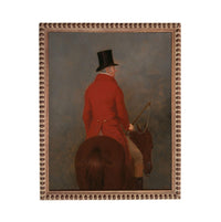A man wearing a red coat and top hat is riding a brown horse.