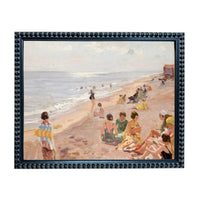 The image is a framed painting depicting a lively beach scene with people enjoying the sun, sand, and water.