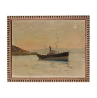 a boat sailing on a body of water, with a rocky coastline in the background.