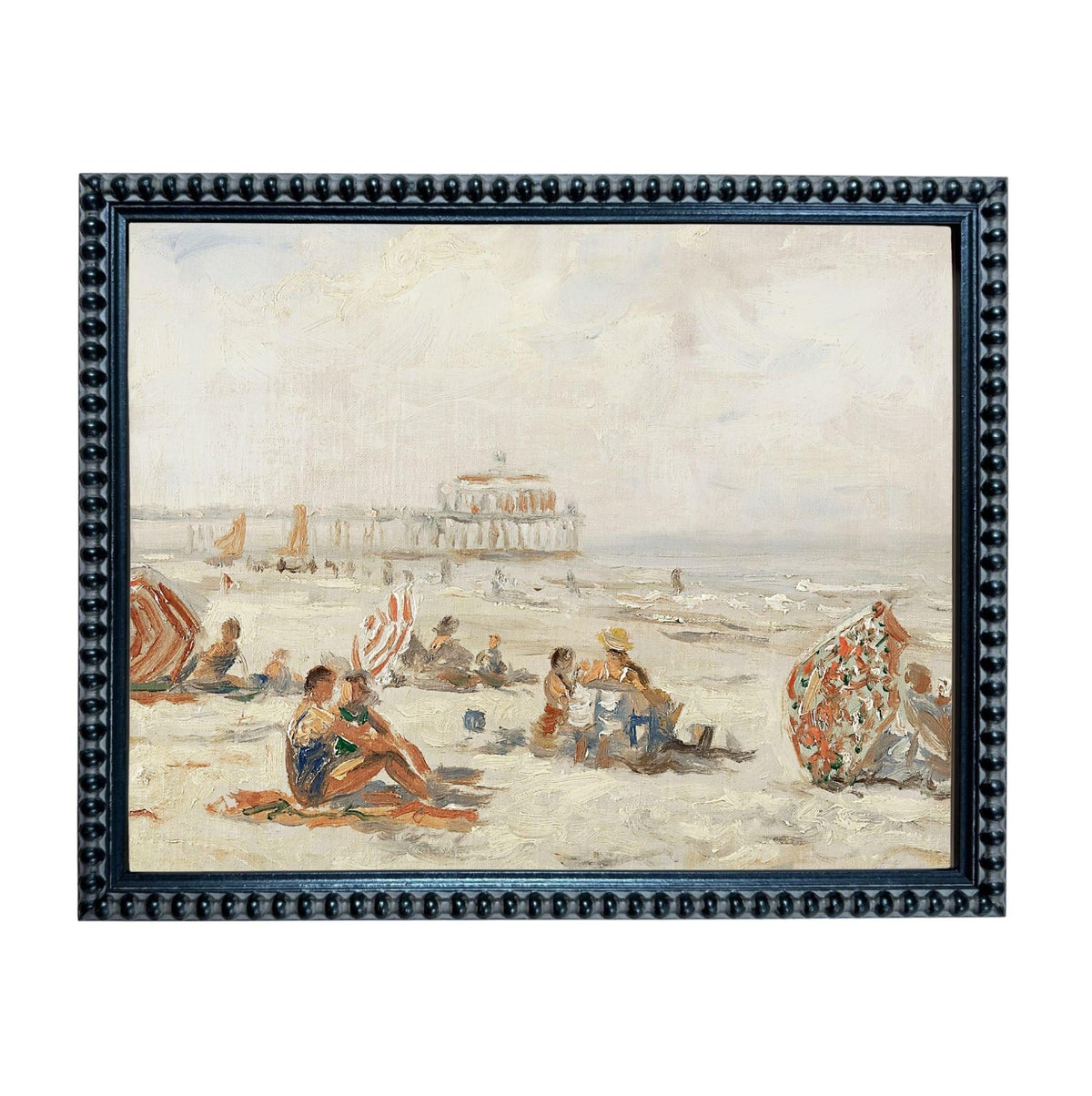 The image is a framed painting depicting a lively beach scene with people relaxing and enjoying the sun.