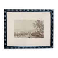 The image is a framed print depicting a rural landscape with a road, trees, and buildings in the distance.