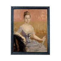 The image is a framed painting depicting a woman in a blue dress sitting in a chair.