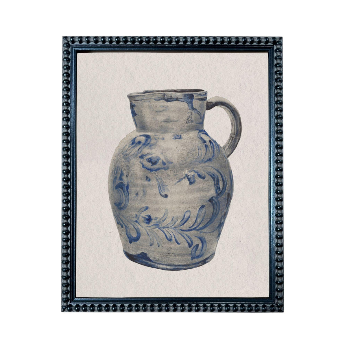 A blue and white ceramic pitcher with a floral pattern on its body.