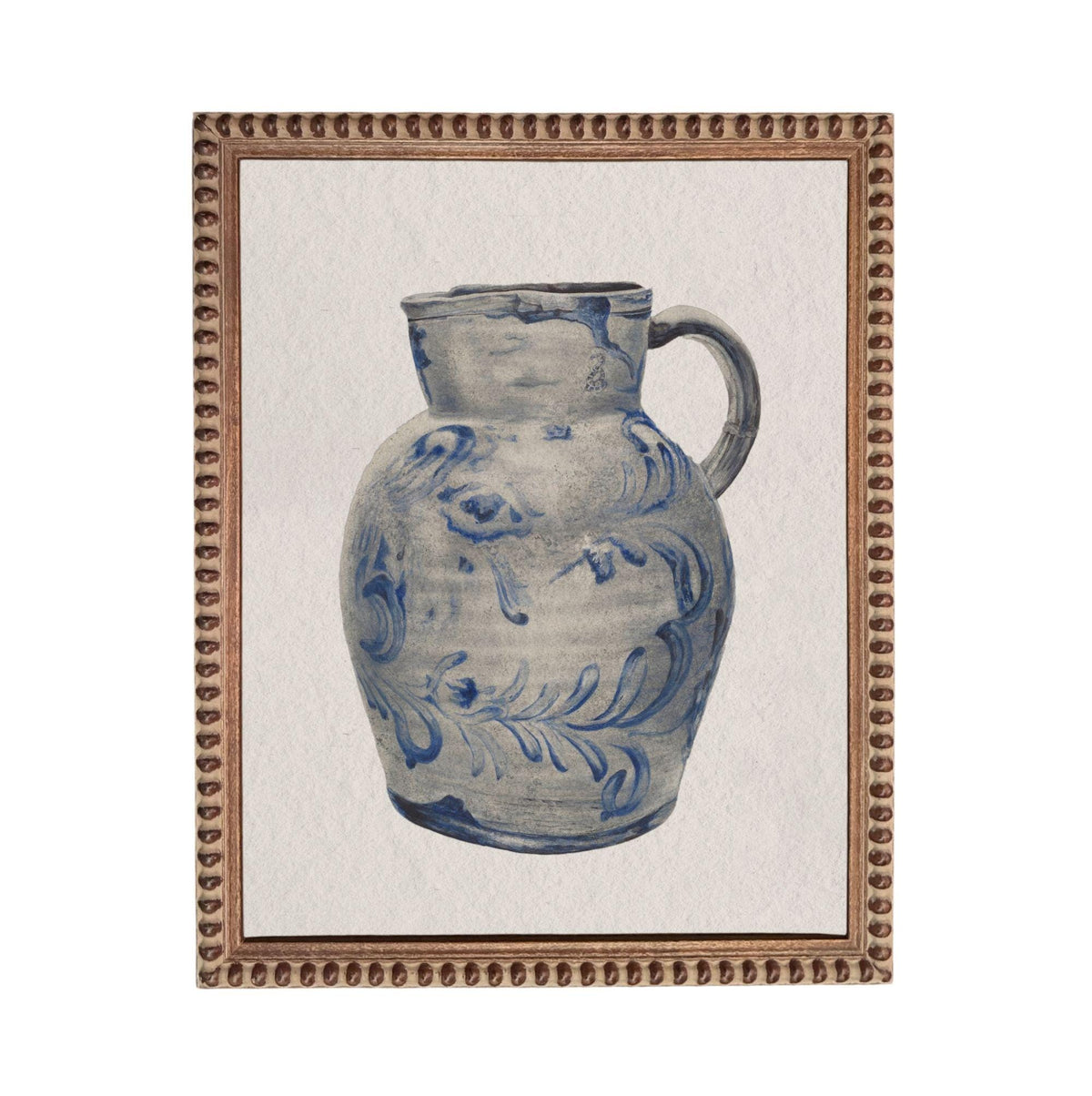 A blue and white ceramic pitcher with a floral pattern on its surface, displayed in a framed artwork.