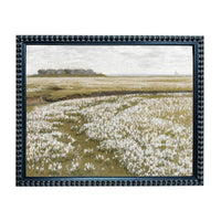 The image is a painting of a field with white flowers, framed in a black frame with a decorative border.