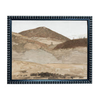The image is a framed painting depicting a mountainous landscape with a hazy, overcast sky.