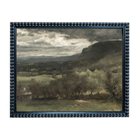 The image is a framed landscape painting depicting a serene countryside scene with rolling hills, trees, and a cloudy sky.