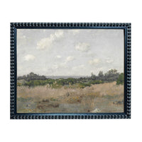 The image is a framed painting depicting a serene landscape with a field, trees, and a cloudy sky.