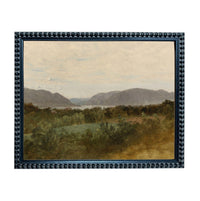 The image is a framed painting depicting a serene landscape with mountains, trees, and a body of water in the distance.