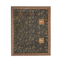 a dark blue and gold patterned fabric with a decorative border.