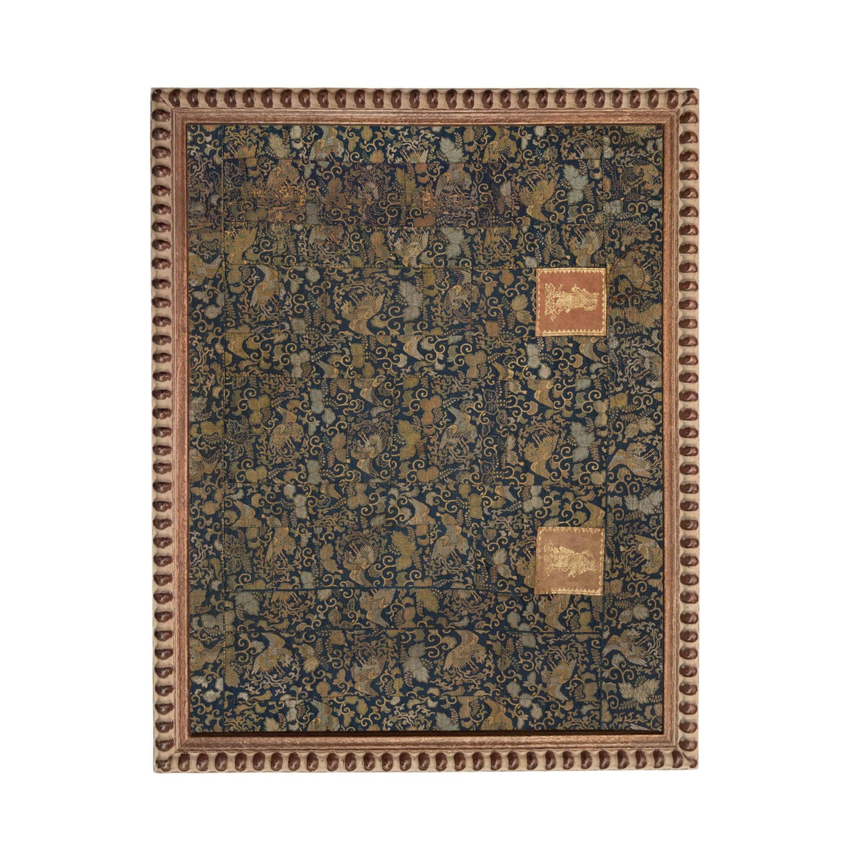 a dark blue and gold patterned fabric with a decorative border.