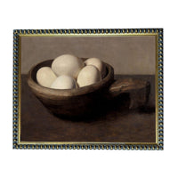 a bowl filled with white eggs, resting on a dark surface.
