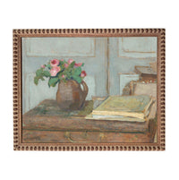 The image is an oil painting depicting a vase of pink roses on a table, with a book and a suitcase in the background.
