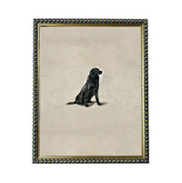 A black dog sitting on a beige background, framed in a decorative gold frame.