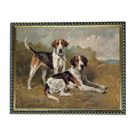 Two hound dogs, possibly beagles, are depicted in a painting. The painting is framed and has a decorative border.