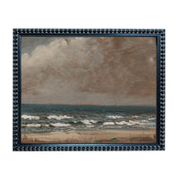 The image is a framed painting depicting a serene ocean scene with waves crashing against the shore.