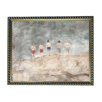 a group of people standing on a rocky shore, with a cloudy sky in the background.