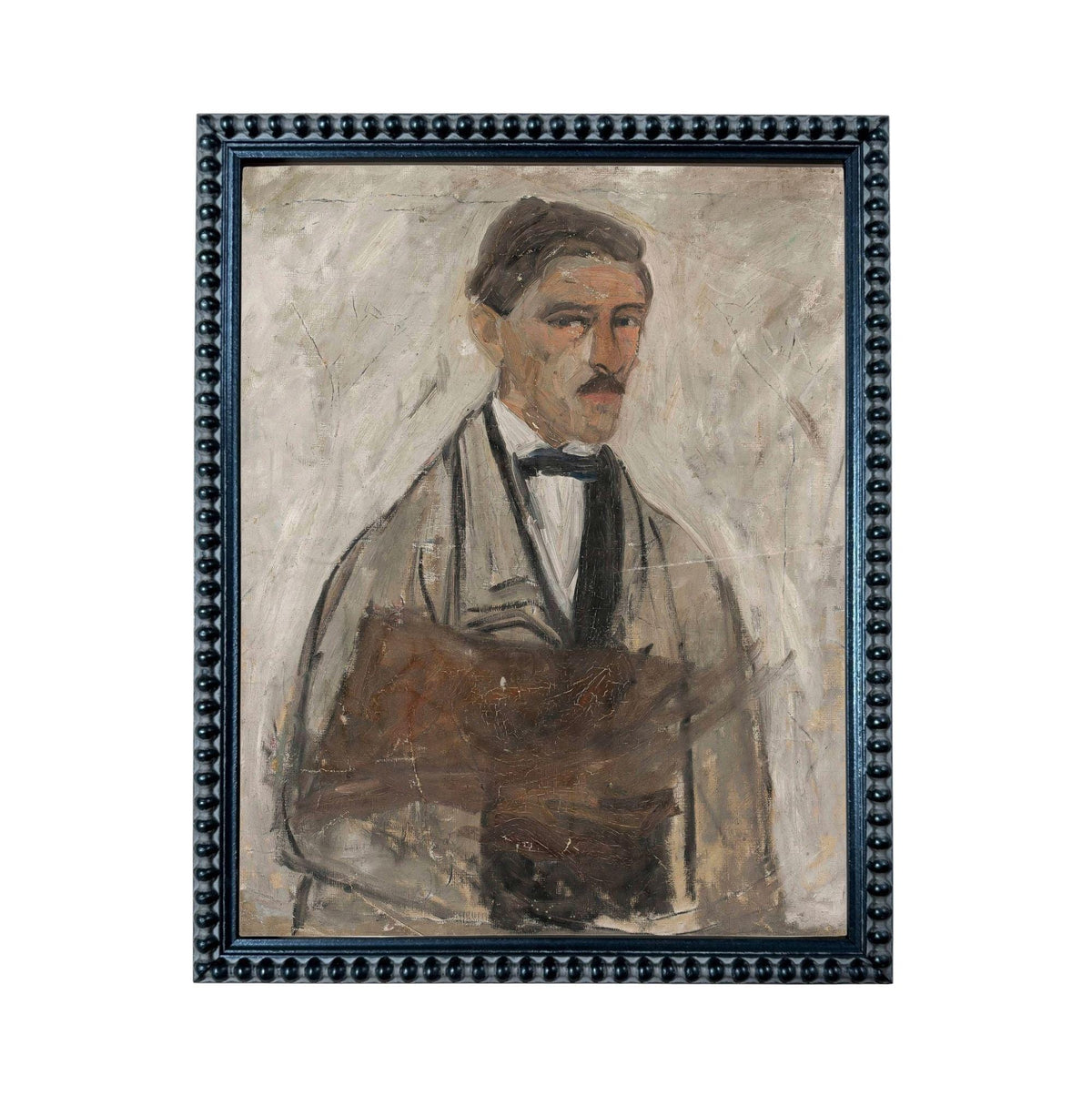 The image is a framed portrait of a man with a mustache, wearing a suit and tie.