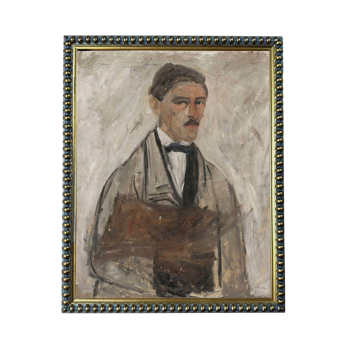 The image is a portrait of a man wearing a suit and tie, with a serious expression on his face.