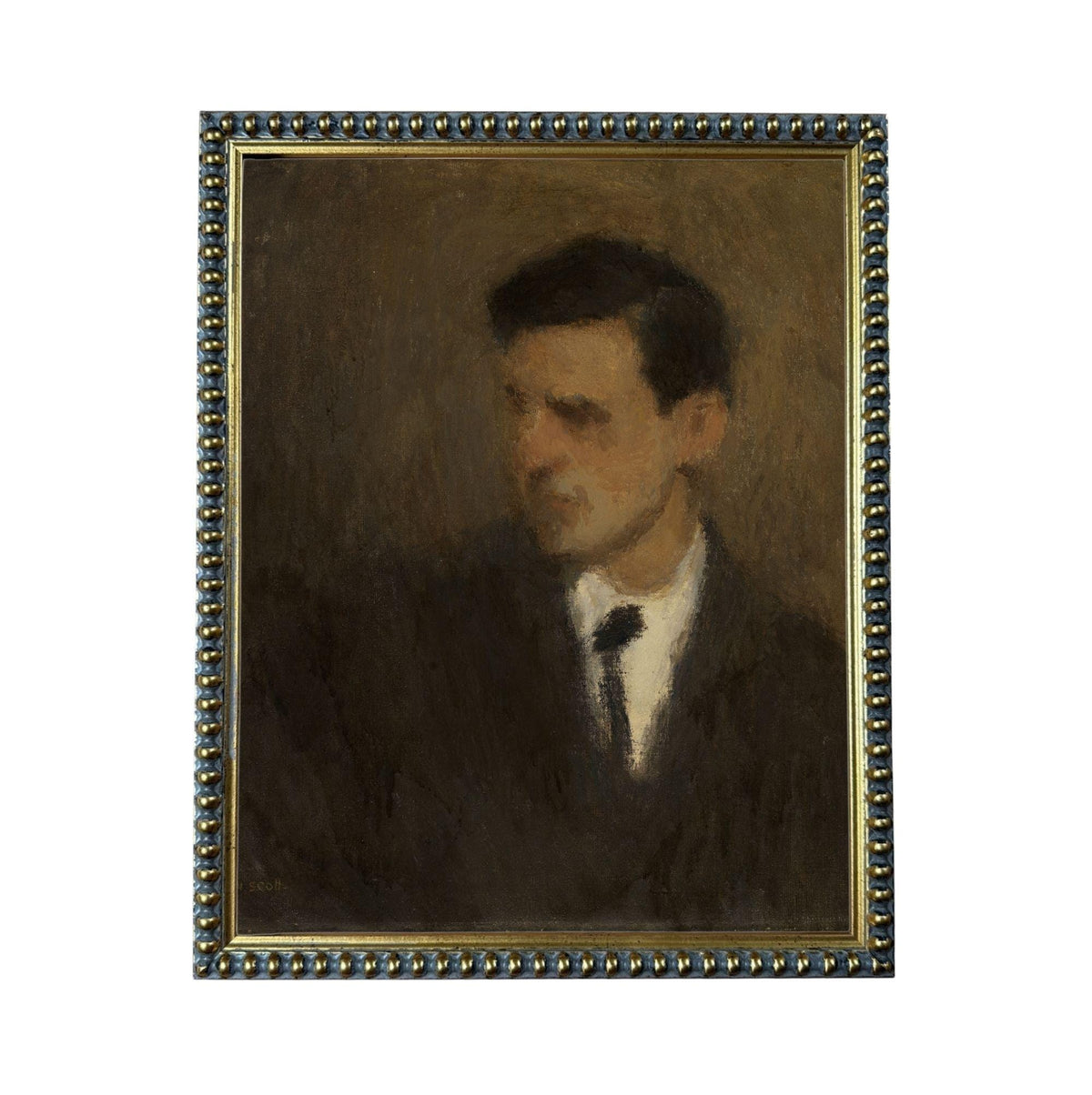 The image is a portrait of a man wearing a suit and tie, with a dark background.