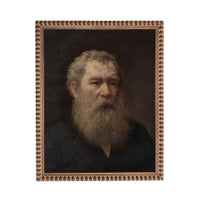 The image is a portrait of an elderly man with a long beard, wearing a dark jacket.