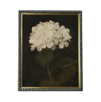 A framed painting depicting a single white flower against a dark background.