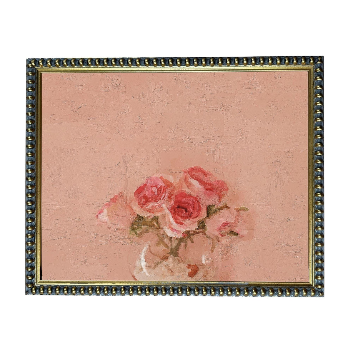 A framed painting depicting a bouquet of pink roses against a peach-colored background.
