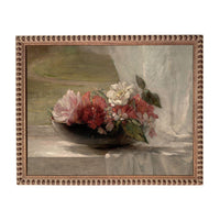 A framed painting depicting a vase filled with a variety of colorful flowers, including pink roses and white flowers, placed on a surface.