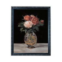 A framed painting depicting a vase filled with pink and white flowers against a dark background.