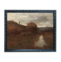 The image is a framed painting depicting a serene landscape with a river or stream running through it, surrounded by trees and hills.
