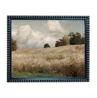 The image is a framed painting depicting a serene landscape with a field of tall grass, trees, and a cloudy sky.