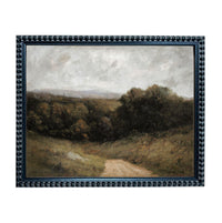The image is a framed landscape painting depicting a dirt road winding through a wooded area with rolling hills in the distance.